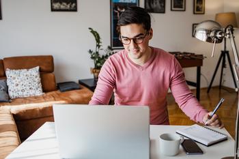 This State Is Offering Up Over $140 Million in Student Debt Relief for Some Workers. Do You Qualify?: https://g.foolcdn.com/editorial/images/746091/man-20s-laptop-smiling-gettyimages-1353890525.jpg