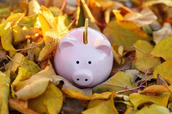 Interest Rates (and Leaves) Are Falling, but Here Are 3 Dividends That Should Continue Rising No Matter What: https://g.foolcdn.com/editorial/images/792089/a-piggy-bank-with-a-coin-in-it-surrounded-by-fall-leaves.jpg