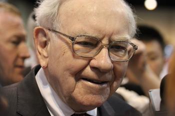 2 Warren Buffett Stocks You Can Buy in January and Hold Forever: https://g.foolcdn.com/editorial/images/713588/warren-buffett-in-a-crowd-smiling.jpg