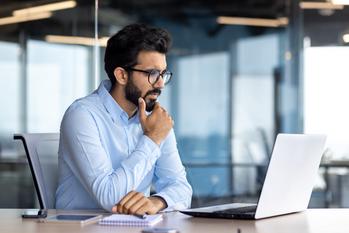 Some Financial Experts Think Target Date Funds Are the Way to Go for Retirement Savings. But Is That the Right Choice for You?: https://g.foolcdn.com/editorial/images/773289/man-20s-laptop-gettyimages-1562983245.jpg