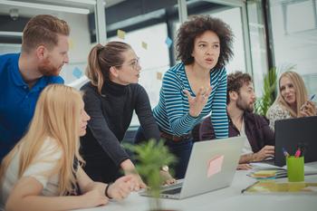 Is The Trade Desk a Good Growth Stock to Buy?: https://g.foolcdn.com/editorial/images/734601/team-at-an-office-debating-ideas_gettyimages-1191131442.jpg