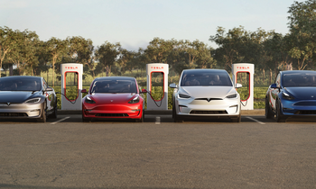 Should You Buy Tesla Stock Before Oct. 10?: https://g.foolcdn.com/editorial/images/791385/four-teslas-in-a-parking-lot-at-a-charger-station.png