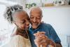 Married or Divorced While Taking Social Security? Here's How It Will Affect Your Benefits.: https://g.foolcdn.com/editorial/images/766383/two-older-people-dancing-together-and-smiling.jpg
