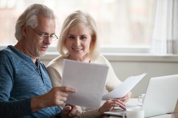 3 Social Security Strategies for Married Couples to Consider: https://g.foolcdn.com/editorial/images/762219/retired-couple-looks-at-papers.jpg