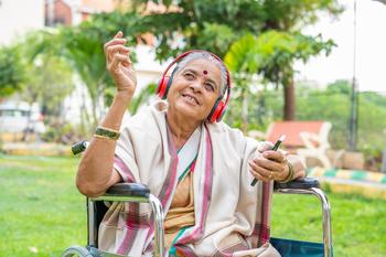 Planning to Retire in 2033? Take These Steps Before You Leave Your Job.: https://g.foolcdn.com/editorial/images/744260/hindu-or-jain-lady-in-wheelchair-with-headphones.jpg