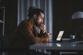 Here Are 3 Things You Need to Do Before Student Loan Repayments Resume Aug. 31: https://g.foolcdn.com/editorial/images/743989/man-on-laptop-2022.jpg