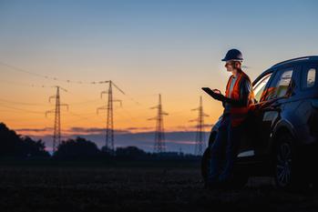 Could This Industry Come Out to Be the Victor of Earnings Season?: https://g.foolcdn.com/editorial/images/730324/engineer-using-digital-tablet-near-car-power-lines.jpg