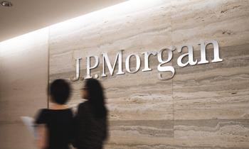 Is JPMorgan Chase Stock a Buy?: https://g.foolcdn.com/editorial/images/781560/inside-jpmorgan-office-with-jpmorgan-logo-on-wall-while-two-people-walk-by_jpmorgan-1.jpg