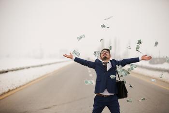 Could Amgen Stock Help You Become a Millionaire?: https://g.foolcdn.com/editorial/images/744164/investor-with-their-arms-open-amid-falling-cash.jpg