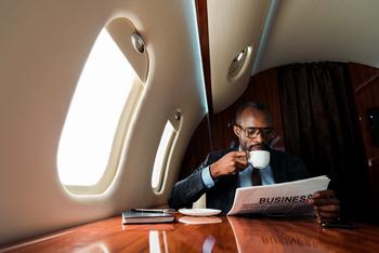 Could NovoCure Stock Help You Become a Millionaire?: https://g.foolcdn.com/editorial/images/744991/person-reading-a-newspaper-on-a-private-jet.jpg
