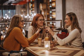 Can Coca-Cola Continue Maximizing Dividends While Balancing Growth?: https://g.foolcdn.com/editorial/images/744013/three-women-drinking-cola-restaurant.jpg