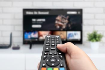 Why Roku Stock Soared This Week: https://g.foolcdn.com/editorial/images/739678/man-watching-tv-remote-control-in-hand.jpg