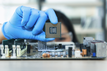 3 Reasons to Buy Intel Stock, and 1 Reason to Sell: https://g.foolcdn.com/editorial/images/756198/hand-holding-a-small-processor-chip.png