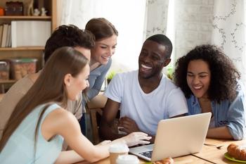 Forget Amazon: Buy This Magnificent E-Commerce Stock Instead: https://g.foolcdn.com/editorial/images/757859/gettyimages-happy-people-gather-around-a-computer.jpg