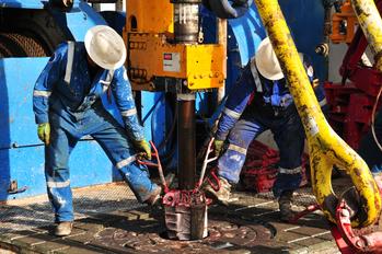 Is ExxonMobil Stock a Buy?: https://g.foolcdn.com/editorial/images/731849/22_09_20-two-people-working-on-a-drilling-rig-for-an-oil-well-_mf-dload.jpg