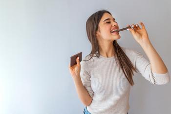 1 Dividend Growth Stock Down 25% to Buy Right Now: https://g.foolcdn.com/editorial/images/791255/24_09_17-a-person-eating-a-chocolate-bar-_mf-dload-gettyimages-1162841580-1199x800-84a960f.jpg