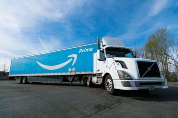 Best Stock to Buy Right Now: Amazon vs. Apple: https://g.foolcdn.com/editorial/images/785675/an-amazon-prime-truck-in-a-parking-lot.jpg