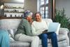 Social Security: 3 Ways a Spouse Can Claim Benefits: https://g.foolcdn.com/editorial/images/739242/two-older-people-sitting-on-a-couch-using-a-laptop-and-smiling.jpg