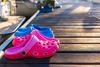 Crocs is Down 58% From Its High. Time to Buy?: https://g.foolcdn.com/editorial/images/708230/pink-and-blue-crocs-sitting-on-a-boat-dock.jpg