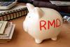 3 Ways to Reduce or Avoid Required Minimum Distributions (RMDs) in 2024 That Everyone Should Know: https://g.foolcdn.com/editorial/images/784791/getty-images-piggy-bank-with-rmd-written-on-its-side-next-to-stack-of-paper-money-retirement-savings-401k-ira-cash-1200x800-5b2df79.jpg