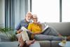 3 Things Seniors Need to Know About Social Security Spousal Benefits: https://g.foolcdn.com/editorial/images/753516/senior-couple-smiling-on-couch-gettyimages-1202951876.jpg