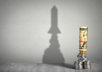 These 3 Dividend Stocks Can Add Some Sizzle to Your Passive Income This Summer: https://g.foolcdn.com/editorial/images/733652/a-stack-of-money-casting-a-shadow-that-looks-like-a-rocket-ship-in-the-background.jpg