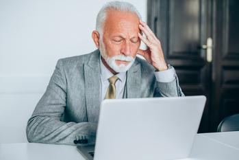 BlackRock CEO Larry Fink Says 65 Is Too Early for Americans to Retire. Is He Right?: https://g.foolcdn.com/editorial/images/771106/older-man-biz-suit-laptop-gettyimages-1186388803.jpg