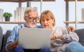 The Surprising Reason You Might Get Less Social Security Than Expected -- and What to Do About It: https://g.foolcdn.com/editorial/images/782133/older-couple-laptop-serious-gettyimages-1375610013.jpg