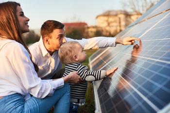 Why Sunnova Energy Stock Trounced the Market on Thursday: https://g.foolcdn.com/editorial/images/692760/two-adults-and-a-baby-touching-a-solar-panel-array.jpg