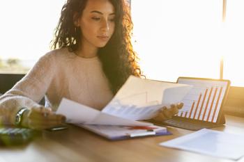 1 Magnificent Vanguard ETF to Turn $300 Per Month Into $592,000 While Barely Lifting a Finger: https://g.foolcdn.com/editorial/images/760311/young-woman-sitting-at-a-desk-looking-at-charts.jpg