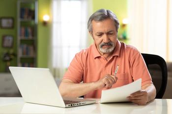 Can't Save as Much for Retirement as You Want? Try These Tactics: https://g.foolcdn.com/editorial/images/697259/mature-person-holding-pen-and-looking-at-document.jpg