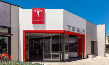 Why Is Everyone Talking About Tesla Stock?: https://g.foolcdn.com/editorial/images/772245/tesla-sales-center-with-tesla-logo-on-building-for-tesla-sales.png