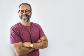 Here's What It Would Take to Achieve a Billionaire Retirement by Age 65: https://g.foolcdn.com/editorial/images/777241/getty-smiling-person-in-pink-tshirt-beard.jpg