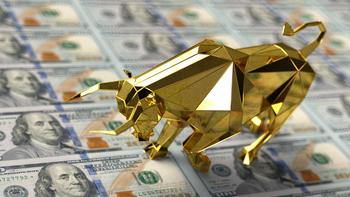 A Bull Market Is Here. 3 Reasons to Buy Realty Income Stock Like There's No Tomorrow.: https://g.foolcdn.com/editorial/images/773963/gold-bull-paper-currency.jpg