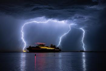 Why 3 Major Cruise Stocks Dropped Today: https://g.foolcdn.com/editorial/images/695319/3-lightning-strikes-around-a-cruise-ship.jpg