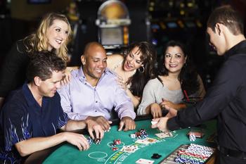 Vici Properties Just Made a Game-Changing Move. Here's What You Need to Know.: https://g.foolcdn.com/editorial/images/784161/21_05_24-five-people-at-a-casino-table-with-an-employee-dealing-cards-_gettyimages-185118796.jpg