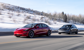 Rough Patch or Dip in the Road? 6 Reasons to Keep Your Eyes on Tesla: https://g.foolcdn.com/editorial/images/768665/two-teslas-in-a-line-driving-on-road-1.png