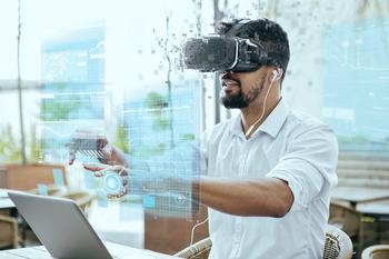 These 2 Monster Metaverse Stocks Are Crushing the Nasdaq in 2023: https://g.foolcdn.com/editorial/images/720505/a-person-using-a-virtual-reality-headset-while-sitting-in-a-cafe.jpg