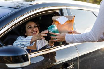 Where Will Dutch Bros Stock Be in 3 Years?: https://g.foolcdn.com/editorial/images/758699/23_12_18-a-person-in-a-car-being-handed-food-and-coffee-at-a-drive-through-window-_mf-dload-gettyimages-1445465706-1200x800-5b2df79.jpg