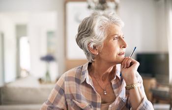 Social Security: Claiming at This Age Could Cost You Thousands: https://g.foolcdn.com/editorial/images/691054/older-person-looking-thoughtful-while-holding-a-pen.jpg