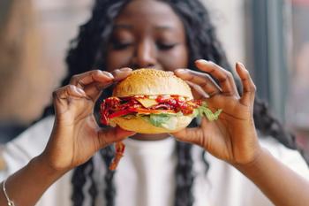 Should Investors Be Concerned About Beyond Meat's Loss of Market Share?: https://g.foolcdn.com/editorial/images/772697/woman-eating-cheeseburger-1200x800-5b2df79.jpg