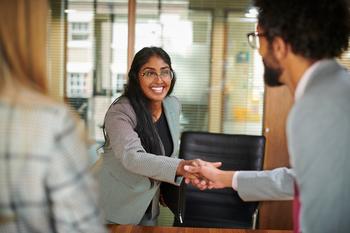 Younger Workers Are Rethinking Traditional Retirement. Should You?: https://g.foolcdn.com/editorial/images/771016/smiling-businessperson-shaking-hands-with-someone.jpg