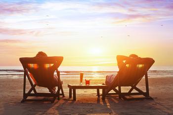 Why Expedia Stock Rocketed Higher on Friday: https://g.foolcdn.com/editorial/images/753704/a-couple-on-lounge-chairs-at-the-beach-enjoying-drinks-and-the-sunset.jpg