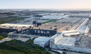 2 "Magnificent Seven" Stocks to Buy Hand Over Fist in March: https://g.foolcdn.com/editorial/images/768450/tesla-gigafactory-in-shanghai-with-tesla-logo.png