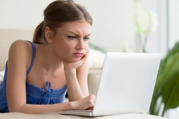 Is The Trade Desk Stock a Buy?: https://g.foolcdn.com/editorial/images/747231/frustrated-looking-young-woman-looking-at-laptop-computer-angry-upset-disappointed.jpg