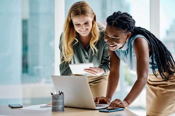 Worried About Banks? Buy This ETF: https://g.foolcdn.com/editorial/images/725715/two-people-looking-at-a-laptop-smiling.jpg