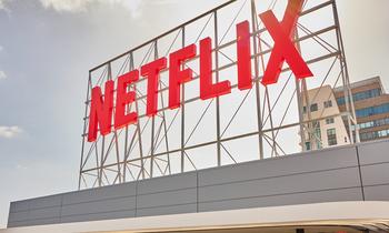 Will Netflix Be a Trillion-Dollar Stock by 2030?: https://g.foolcdn.com/editorial/images/783929/building-with-netflix-logo-on-top_netflix.jpg