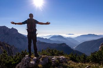 The S&P 500 Could Reach Record Highs in 2024. According to History, This Stock Will Soar.: https://g.foolcdn.com/editorial/images/759286/person-on-top-of-a-mountain.jpg