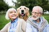 4 Serious Differences Between Men and Women When It Comes to Retirement: https://g.foolcdn.com/editorial/images/727627/smiling-senior-couple-looking-at-adorable-dog.jpg