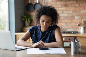 Money and Mental Health: 4 Steps to Take Control of Your Financial Life: https://g.foolcdn.com/editorial/images/734641/person-using-calculator.jpg